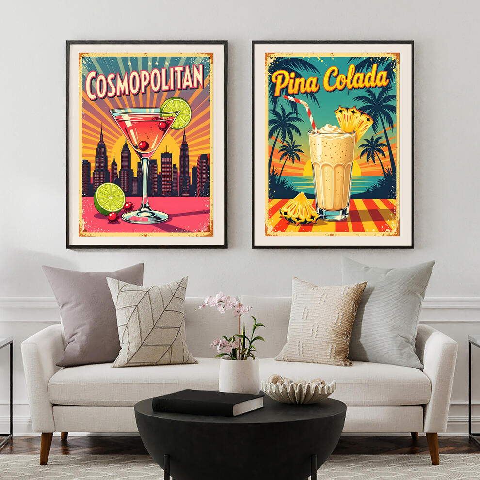 Two framed retro cocktail posters-cosmopolitan and pina colada, styled in a modern living room setting.